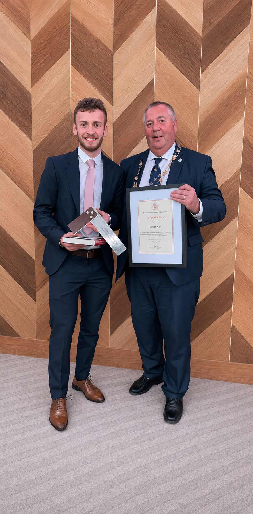 Oliver Watt of Modula receiving the Certificate of Merit from The Worshipful Company of Joiners and Ceilers
